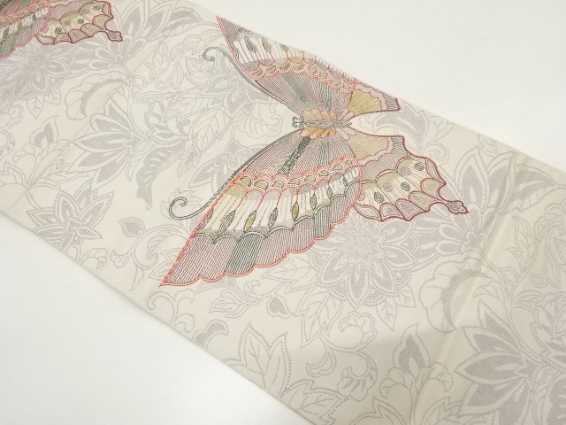 蝶に草花模様織り出し　名古屋帯